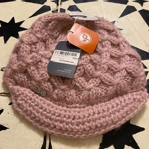 pink knit hat with brim and fleece lining